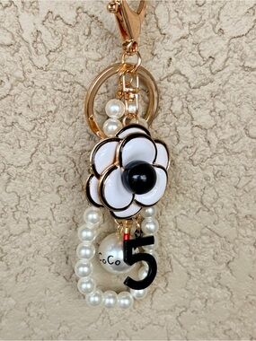 Luxe Gold & White Flower Keychain Charm with Black Accents